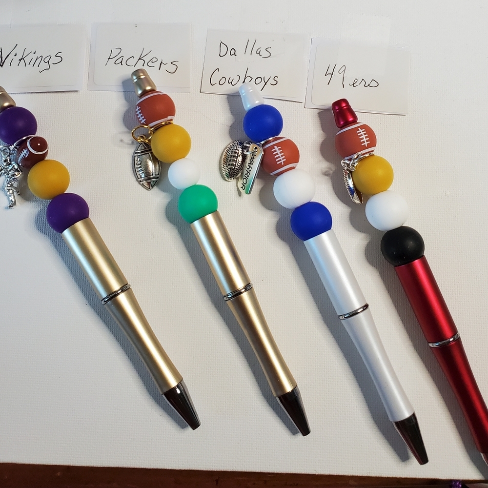 Beaded charmed pens hand crafted (football).